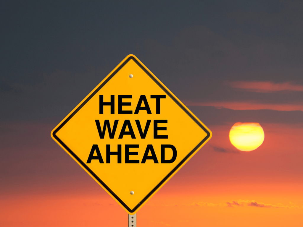 sign with heat wave ahead printed