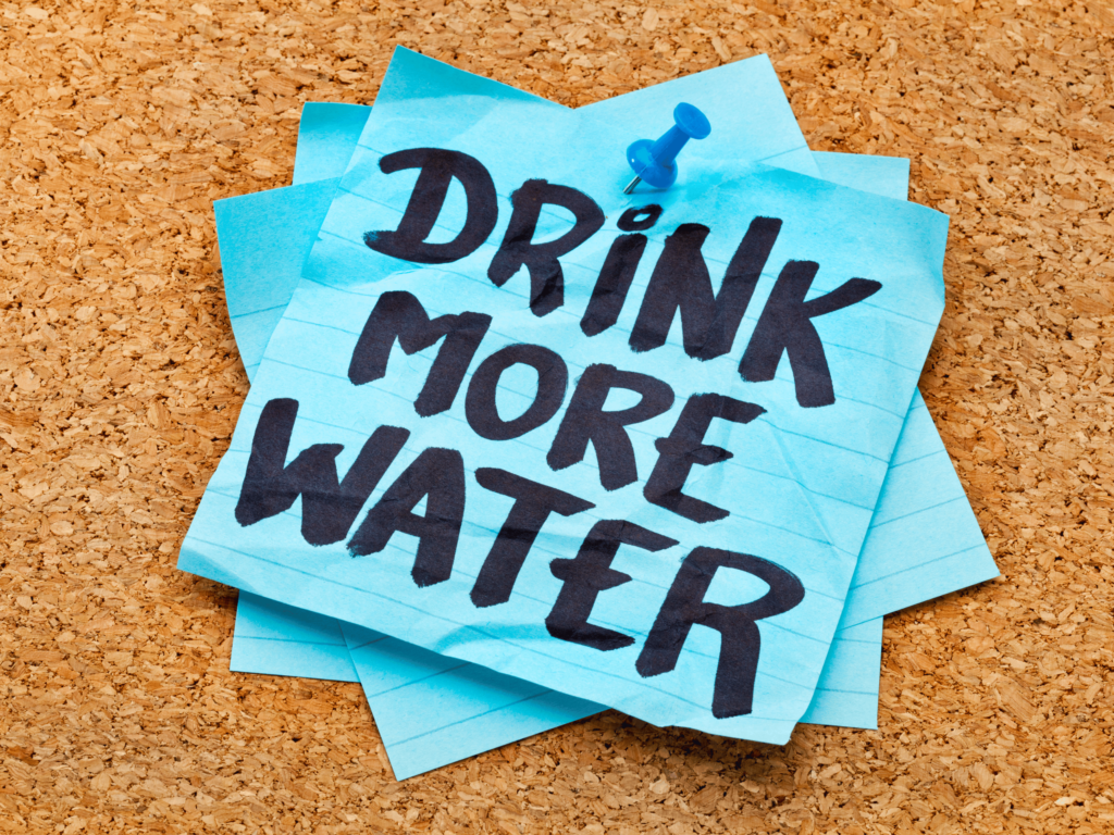 Post it note reminder about drinking more water to stay hydrated