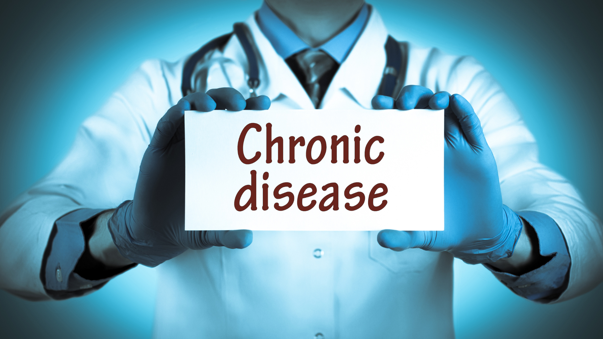 A doctor holding a chronic disease sign