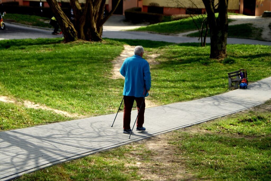 a senior on a 30-minute walk in a park