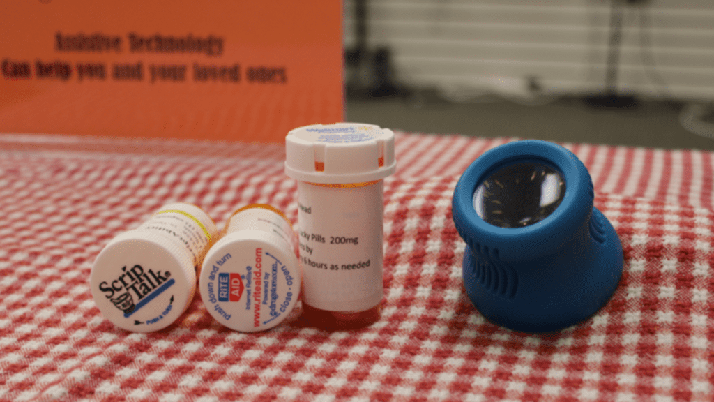 The Pill Bottle Opener and Magnifier on display in MAC's Assistive Technology Ceneter